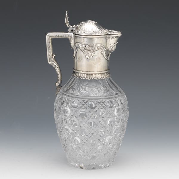 Appraisal: GERMAN SILVER CLARET JUG Cut crystal jug with silver handle