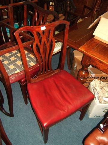 Appraisal: A set of four Georgian mahogany dining chairs with pierced