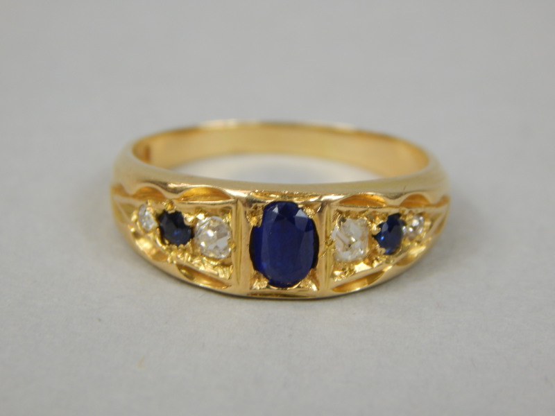 Appraisal: An ct gold dress ring set with sapphire and diamonds