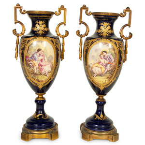 Appraisal: A Pair Gilt Metal Mounted S vres Style Porcelain Urns