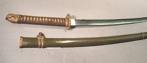 Appraisal: A Japanese officer's Showa Shin-gunto Slightly curved inch blade Gilt