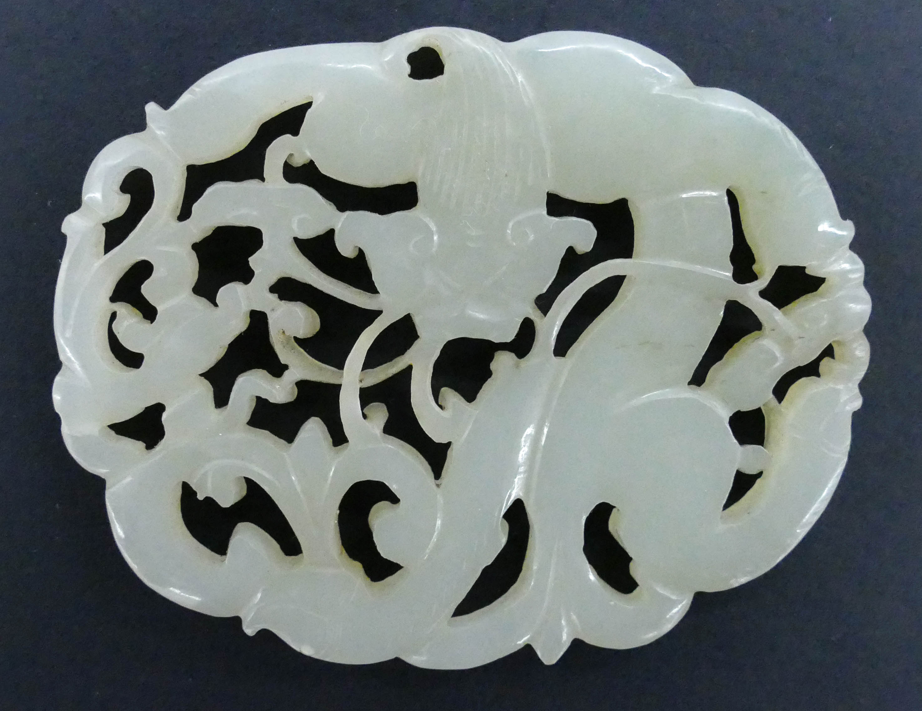 Appraisal: Chinese Qing Jade Qilin Pierced Pendant '' A pale celadon