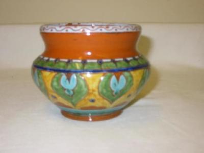 Appraisal: A CARLO MANZONI TERRACOTTA POT of baluster form inscribed with