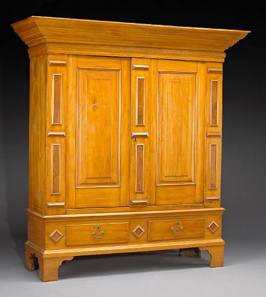 Appraisal: A Chippendale maple and walnut kas late th early th