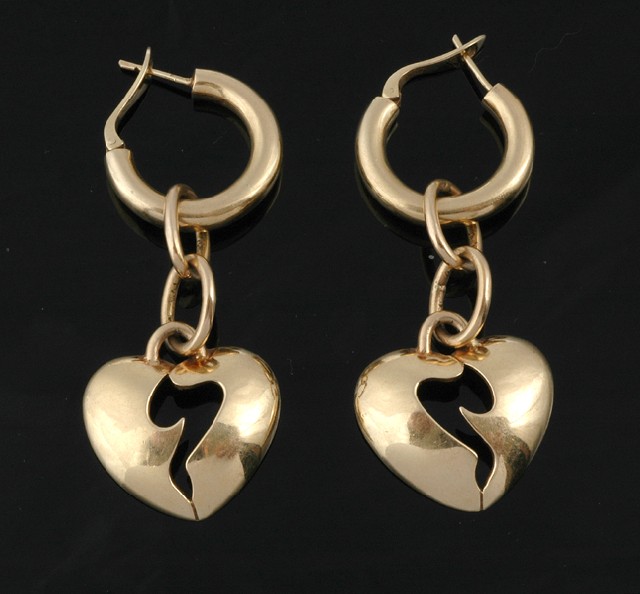 Appraisal: A pair of gold drop earrings The ct gold open