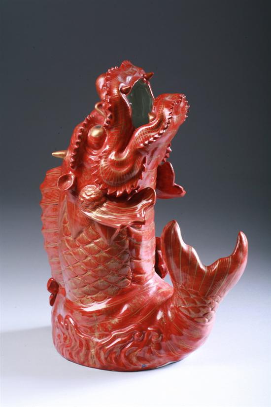 Appraisal: CHINESE COPPER RED AND GILT PORCELAIN DRAGON-FISH FORM VASE late