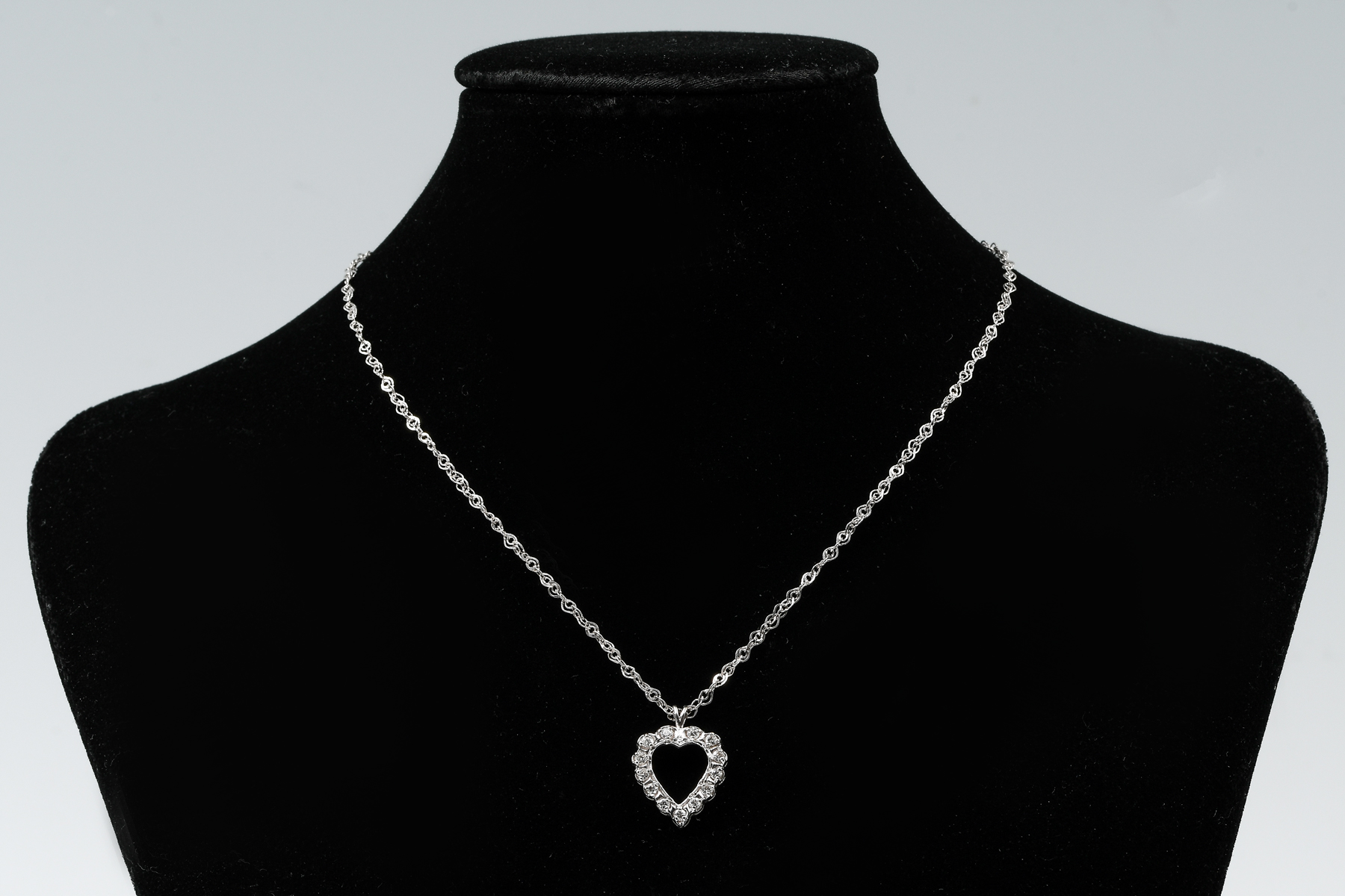 Appraisal: K DIAMOND PENDANT CHAIN K white gold heart pendant contains