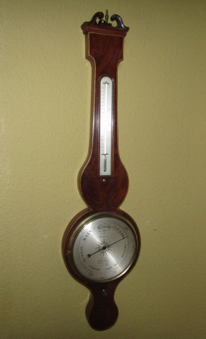 Appraisal: A thC mahogany and boxwood wheel barometer by D Gugeri