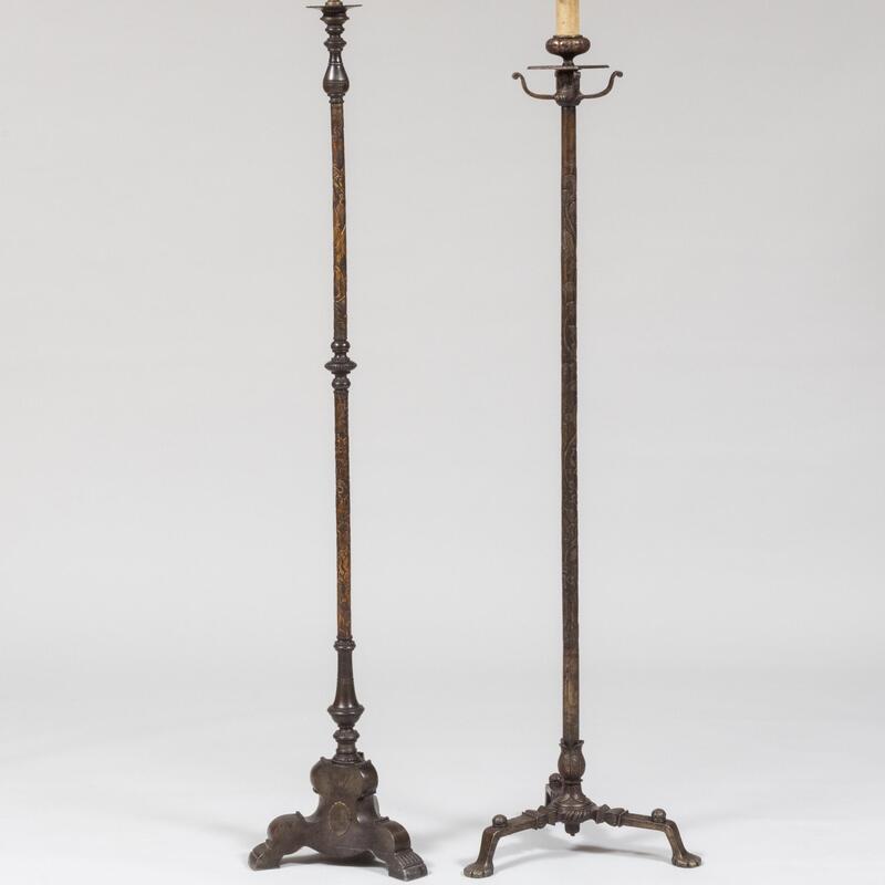 Appraisal: Two Similar Wrought-Iron and Steel Floor Lamps The tallest ft