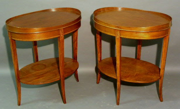 Appraisal: Pair of mahogany Hepplewhite style oval end tables by Mersman