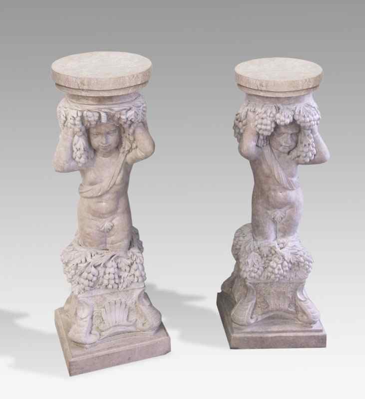 Appraisal: PAIR OF CARVED PINK MARBLE PUTTI FIGURAL PEDESTALS Approx ''