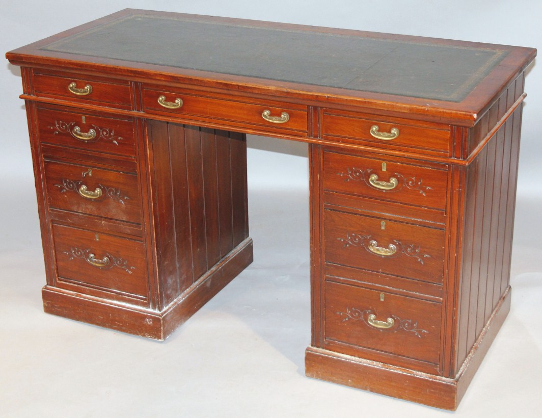 Appraisal: A late thC stained oak and walnut pedestal writing desk