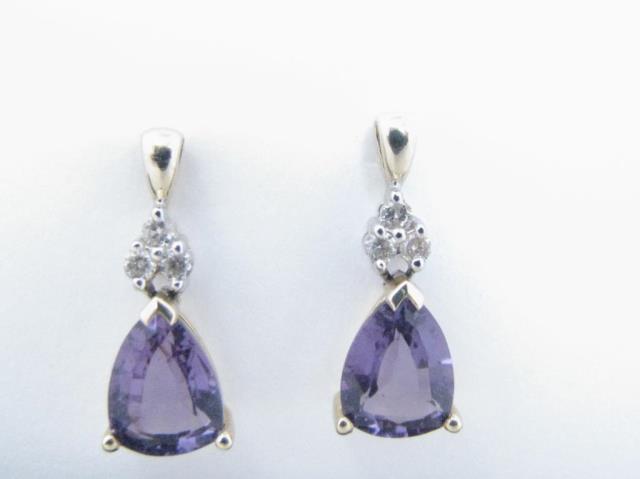 Appraisal: A pair of drop earrings with trillion cut amethyst measuring