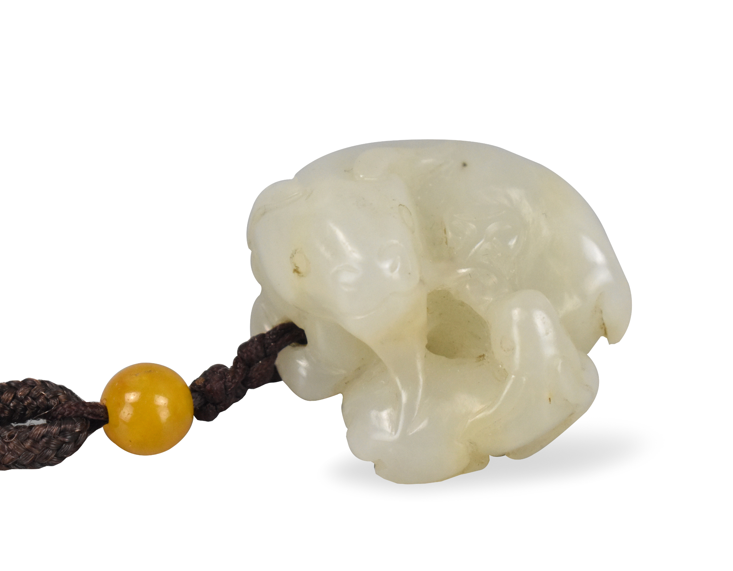 Appraisal: A Chinese white jade carving of two goats dating from