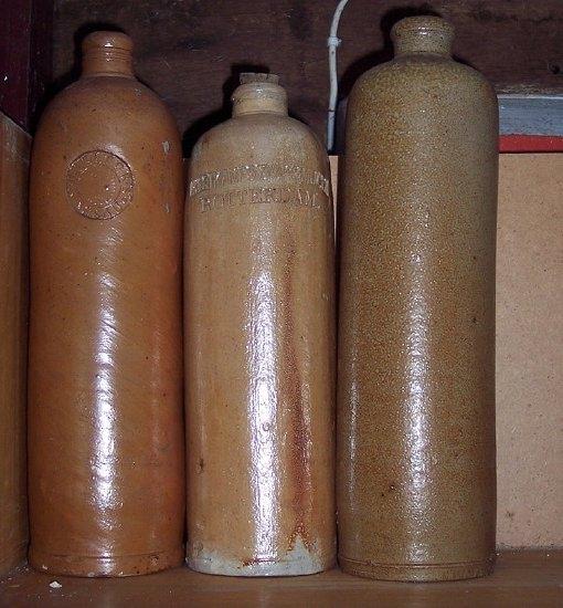 Appraisal: A stoneware flask stamped Nassau another stamped Rotterdam and another