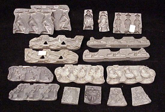 Appraisal: Nine pewter chocolate molds including a kangaroo chickens ducks cupid