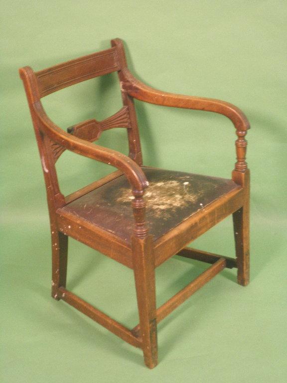 Appraisal: An early thC mahogany open armchair the bar back with