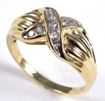 Appraisal: MAN'S DIAMOND AND FOURTEEN KARAT GOLD RING set with nine