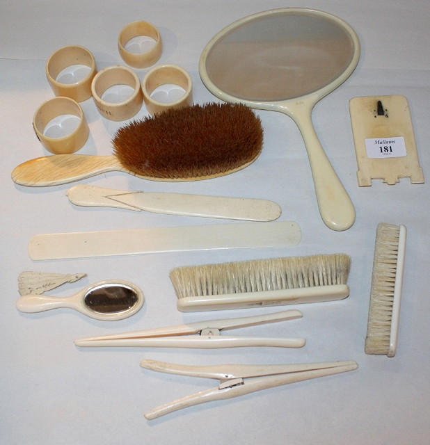 Appraisal: A COLLECTION OF IVORY AND FAUX IVORY BACKED BRUSHES mirrors