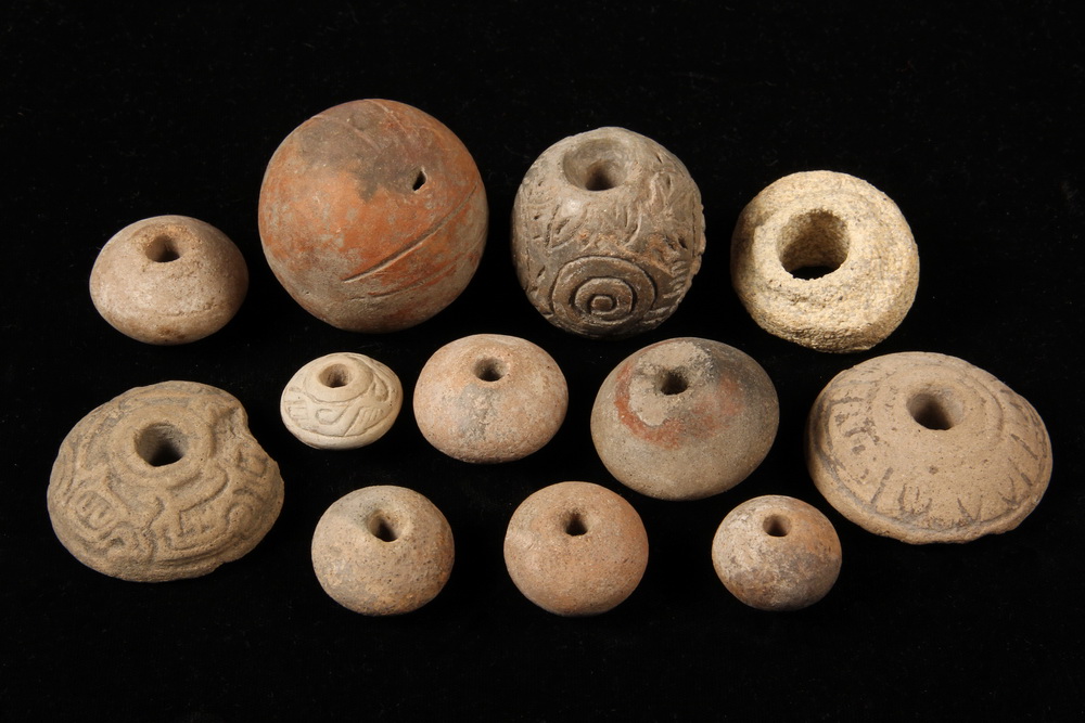 Appraisal: PRE-COLUMBIAN POTTERY - Spinning Weight Beads Ball-Form Rattle most with