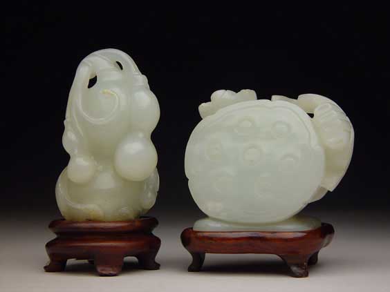 Appraisal: TWO ANTIQUE JADE TOGGLES Two well carved antique Chinese jade