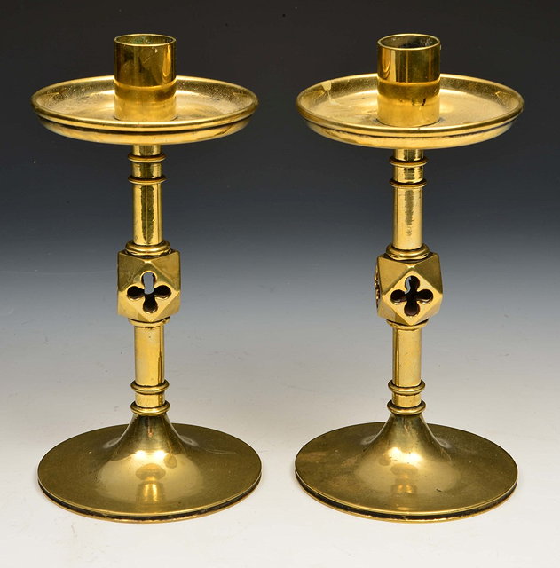 Appraisal: A PAIR OF TH CENTURY PUGINESQUE BRASS CANDLESTICKS with drip