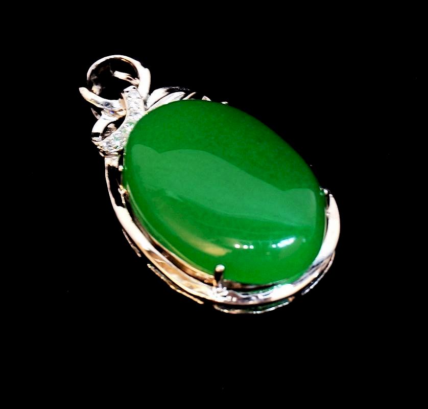 Appraisal: Green Jade Pendant Green Jade Pendant Description A green oval