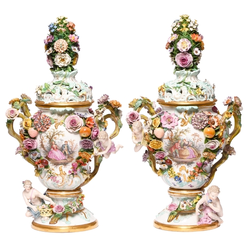 Appraisal: Two Meissen fruit and flower encrusted pot pourri vases and