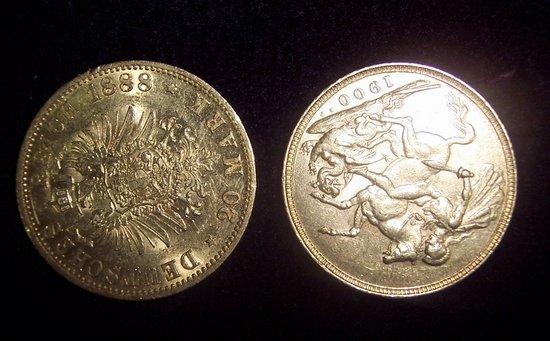 Appraisal: A gold sovereign and a mark coin dated