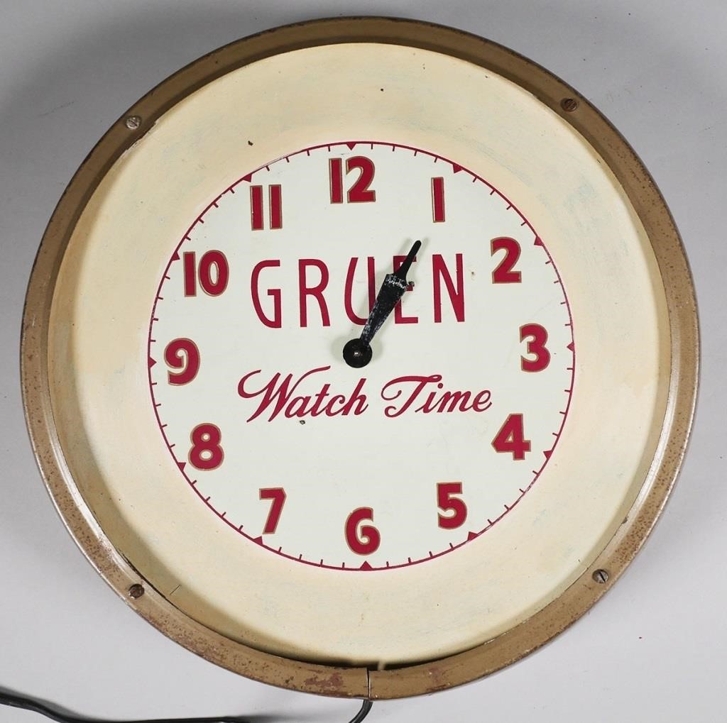 Appraisal: Vintage Gruen advertising electric wall clock Synchron motor which has