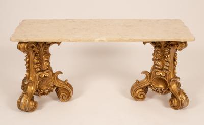 Appraisal: A modern coffee occasional table the shaped rectangular variegated marble