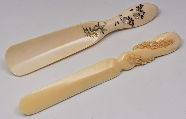 Appraisal: A Japanese ivory shoehorn and a Japanese ivory paperknifelate th