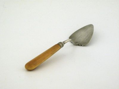 Appraisal: A George III ivory handled butter spade by George Smith