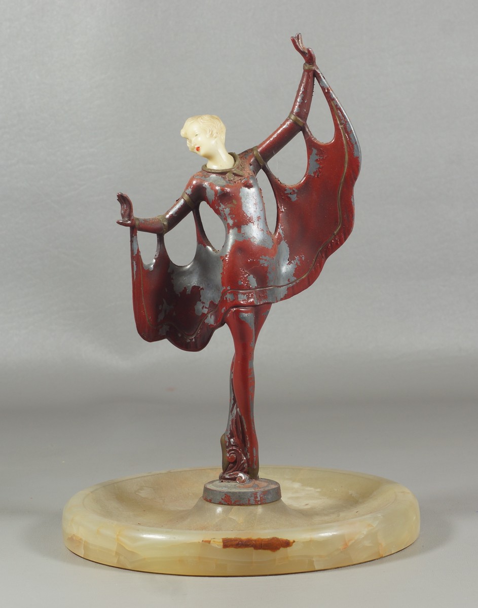 Appraisal: Gerdago Style Figure of a painted metal dancer with composition