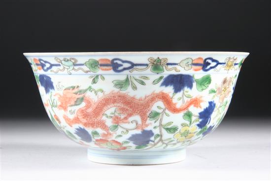 Appraisal: CHINESE WUCAI PORCELAIN BOWL Qianlong mark Depicting dragons chasing the