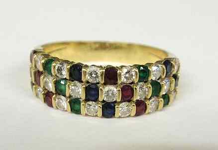 Appraisal: Multi-gem band k yg containing three rows of diamonds emeralds