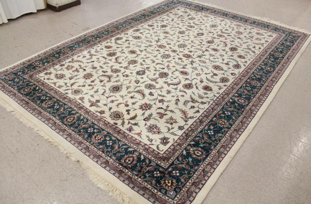 Appraisal: HAND KNOTTED ORIENTAL CARPET Indo-Persian overall floral design on cream