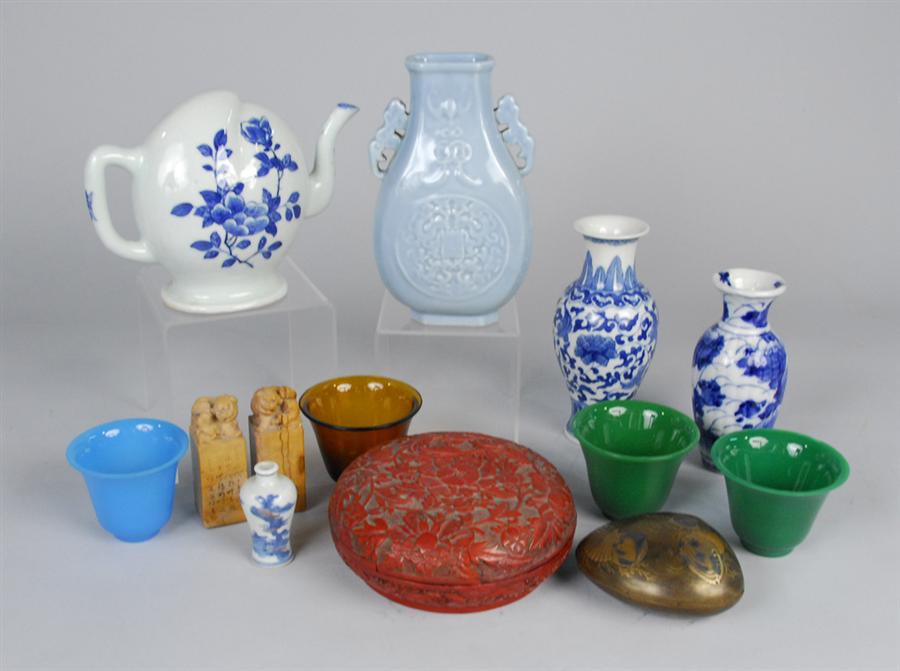 Appraisal: COLLECTION OF ASIAN DECORATIVE OBJECTS including pair of carved food