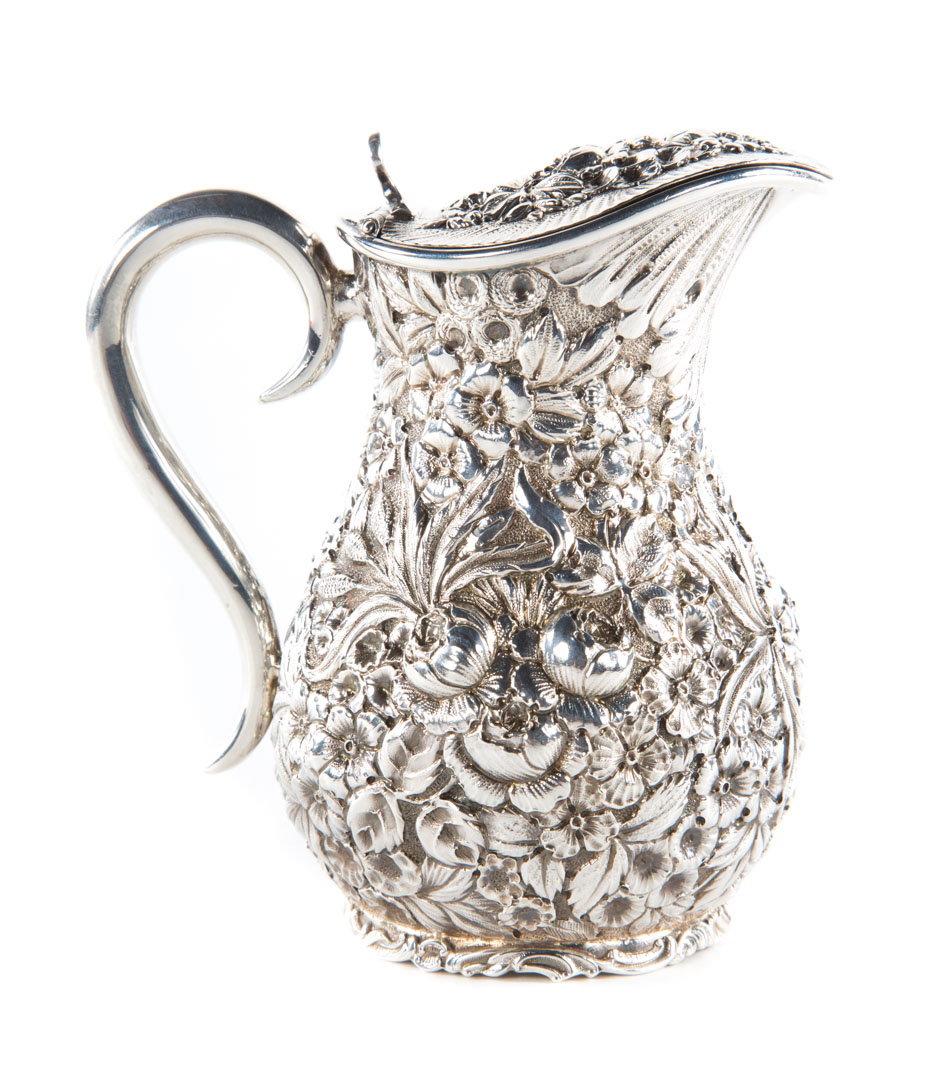 Appraisal: American repousse sterling silver syrup pitcher late th early th