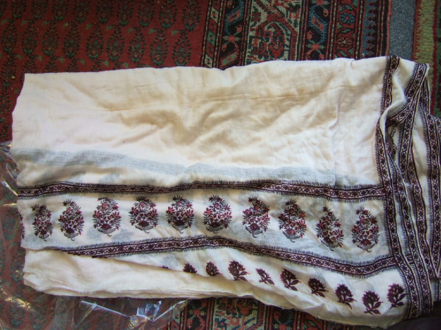 Appraisal: A man's white muslin block painted wrap dated the pink