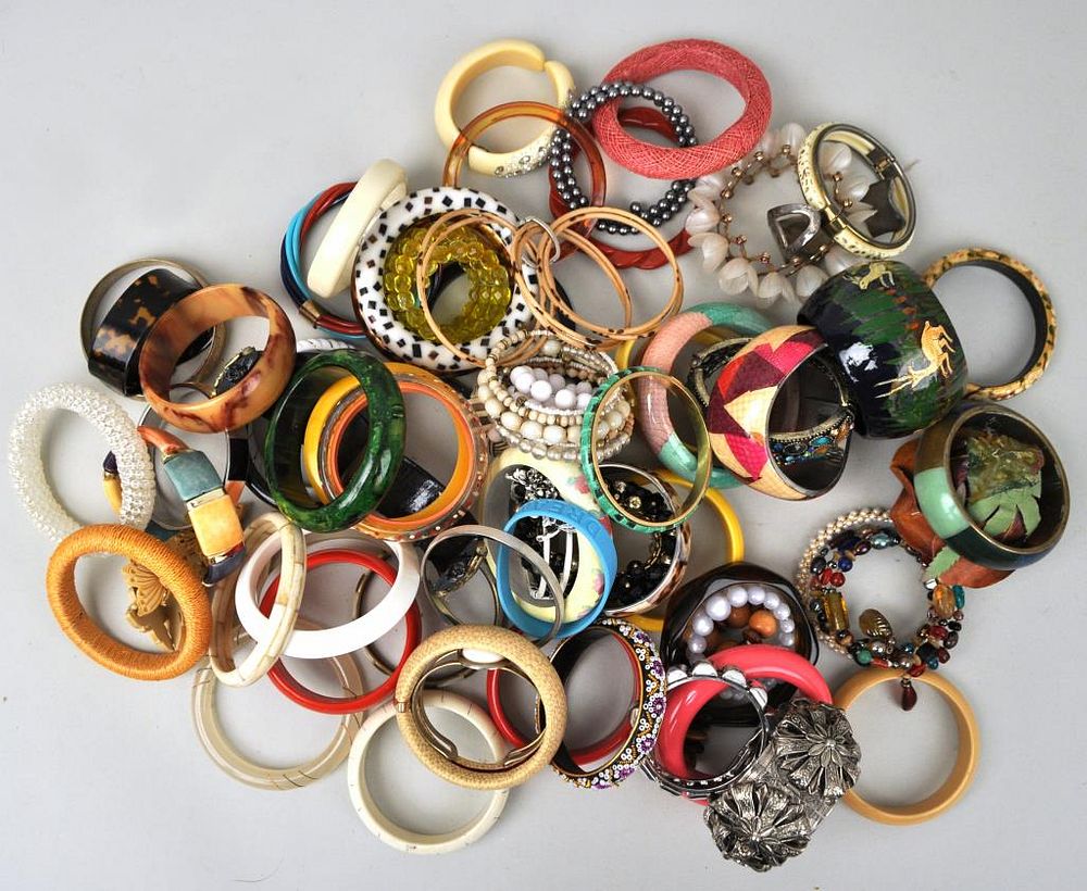 Appraisal: Discovery Group Costume Bangle Bracelets with use wear losses All