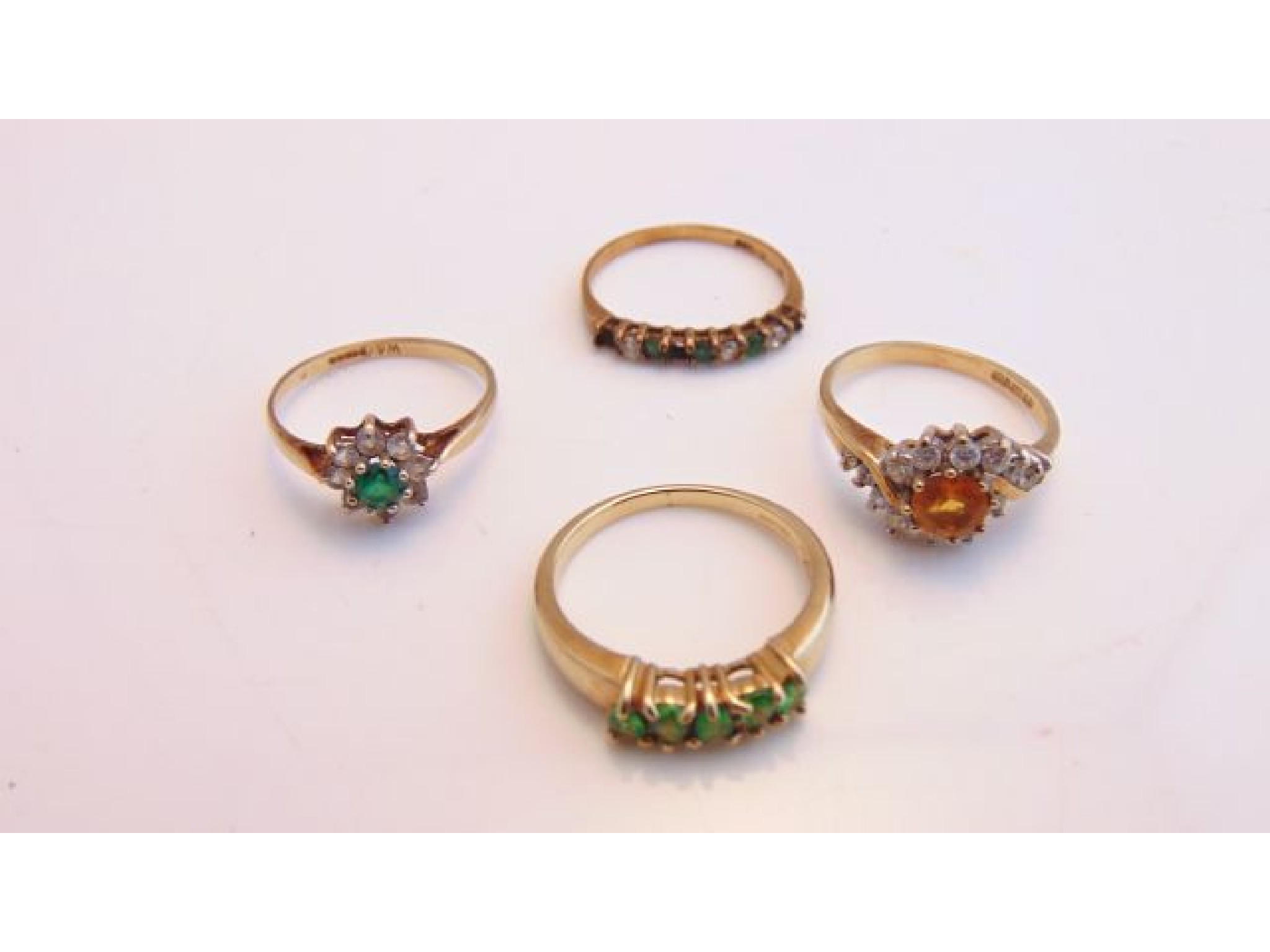 Appraisal: Four gem-set rings each in ct gold g in total