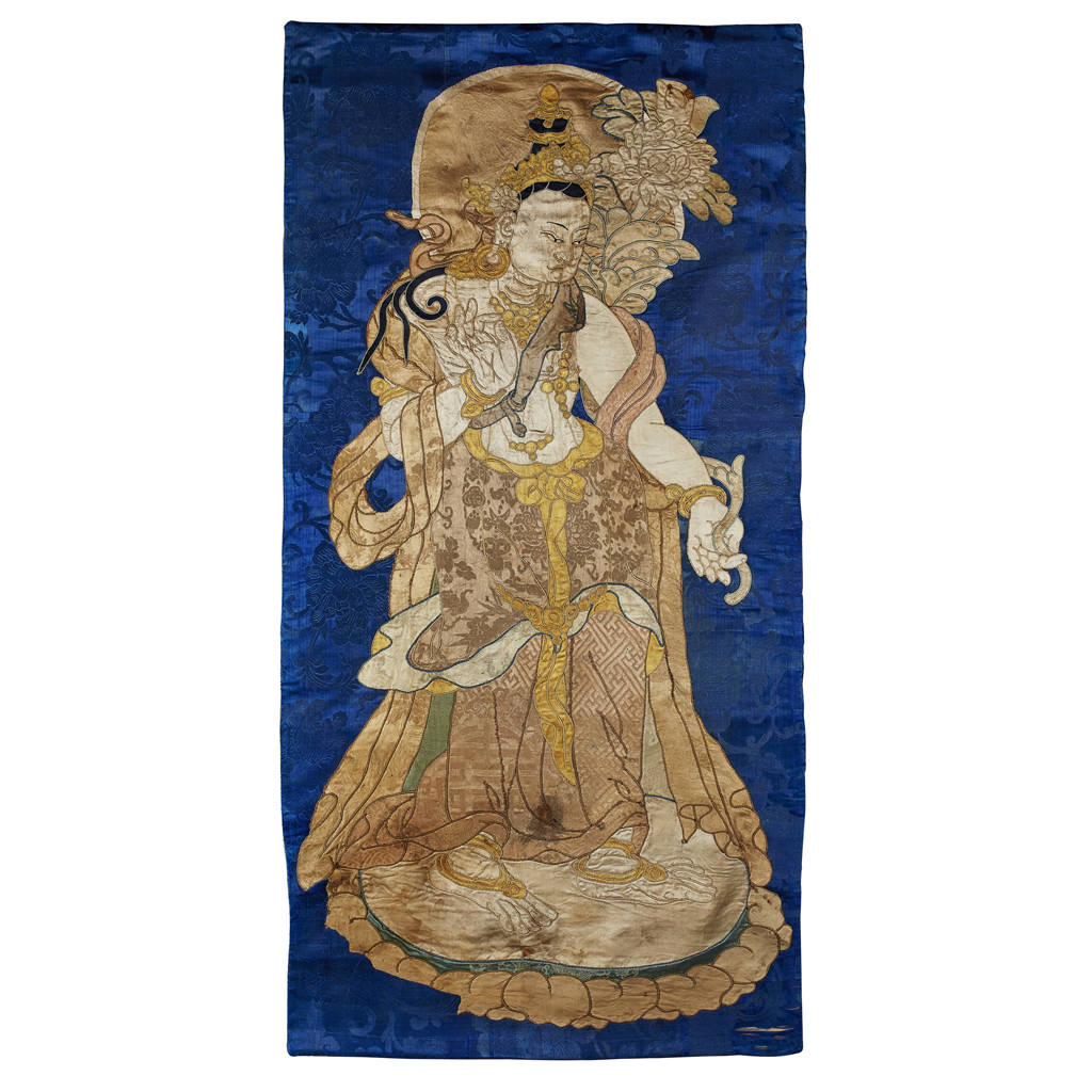 Appraisal: SILK APPLIQU THANGKA OF A BODHISATTVA NEPAL TH CENTURY the