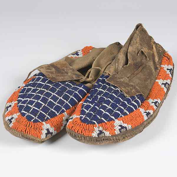 Appraisal: Northern Plains Beaded Hide Moccasins sinew-sewn and beaded using colors