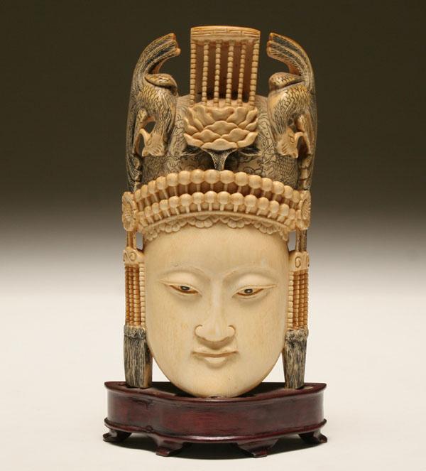 Appraisal: Carved ivory tusk of a Buddha head the crown with