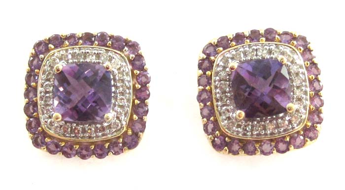 Appraisal: PAIR OF AMETHYST AND DIAMOND EARRINGS each k gold centering