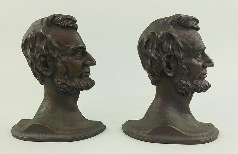 Appraisal: PR PATINATED CAST IRON BOOKENDS OF LINCOLN IN PROFILELate th