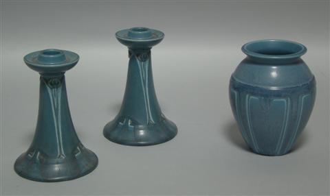 Appraisal: ROOKWOOD VASE AND CANDLESTICKS Impressed date vase with tapering panelled