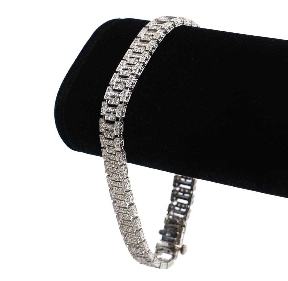 Appraisal: K WG DIAMOND FLEXIBLE BRACELET K white gold articulated Art