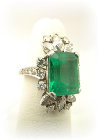 Appraisal: Lady's platinum created emerald and diamond ring with one emerald